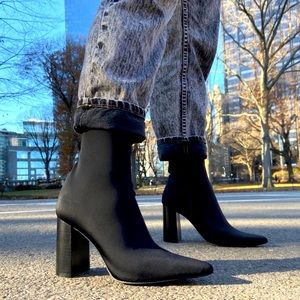 Worn once Black Neoprene boots. cute&comfortable. The heel was too high for me